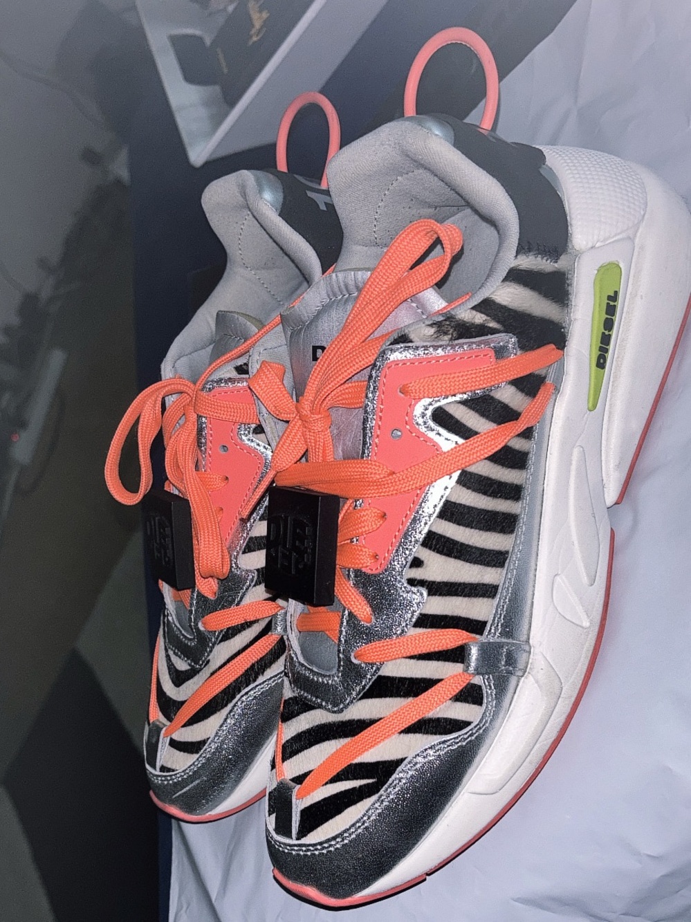 Metallic Silver Zebra Sneakers with Coral Accents